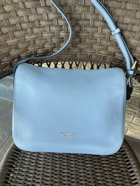KATE SPADE. Blue Shoulder Bag w/ gray interior. Tassel & spade on side. Like New